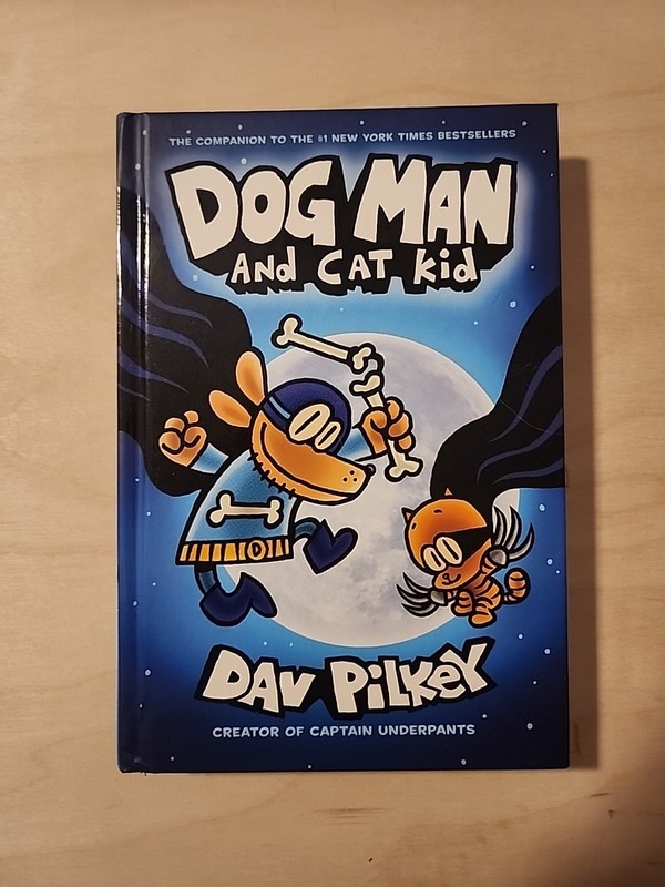 Dog Man And Cat Kid By: Dav Pilkey