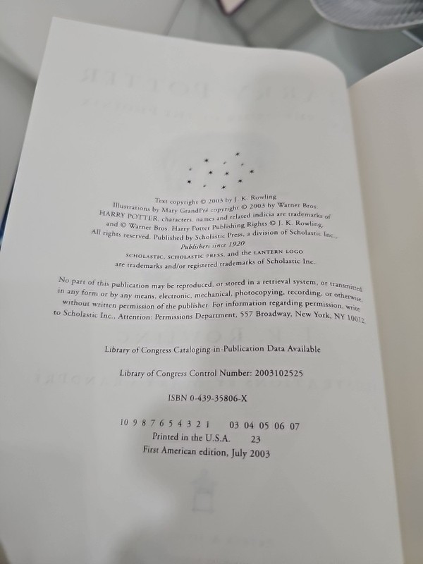 Harry Potter and the order of the phoenix 1st US edition, 7/03 RARE W/ ERROR gallery