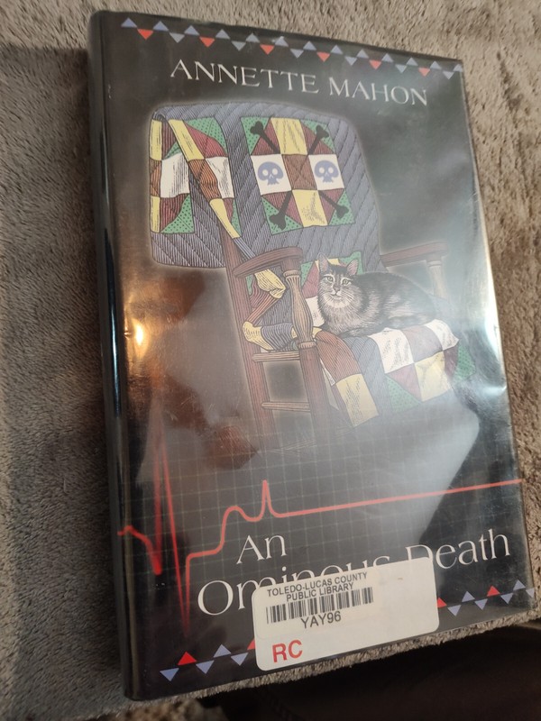 AN OMINOUS DEATH By Annette Mahon – Hardcover **Mint Condition**